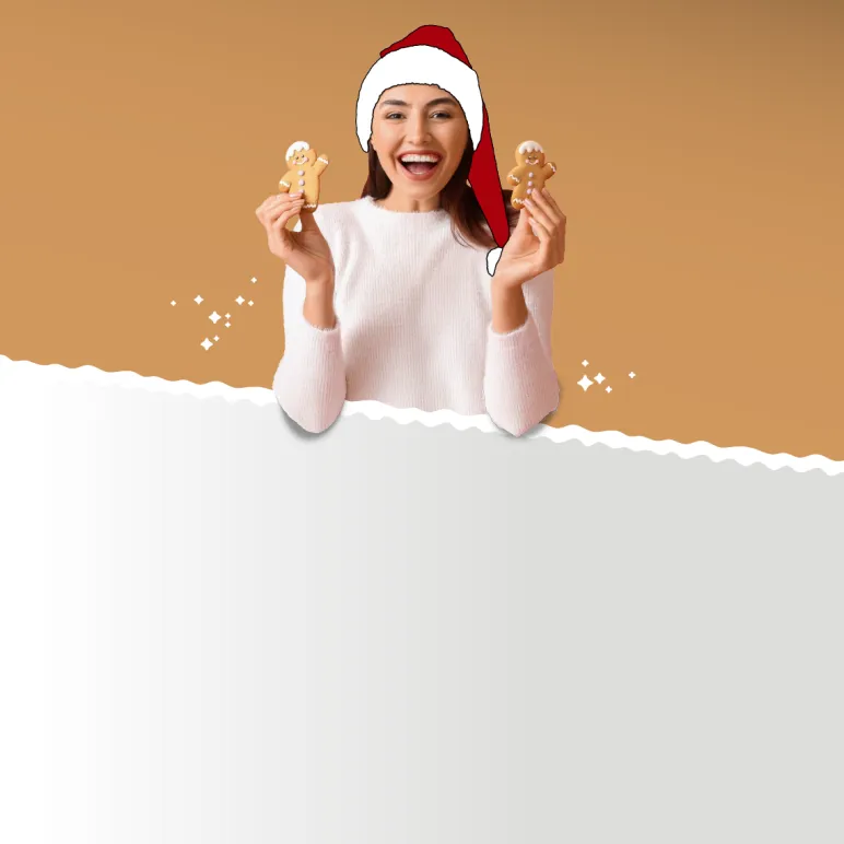 kobieta w czapce mikołaja trzymająca pierniczki